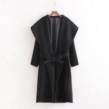 Пальто жіноче з поясом і об'ємним коміром чорне Grace оптом (код товара: 55561)